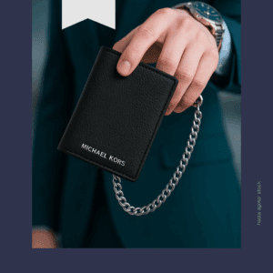 Por la compra de un perfume Homme en la marca Michael Kors llévate, una billetera.